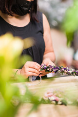 Florist hands detail arrangement flowers decoration. woman owner business plant shop worker