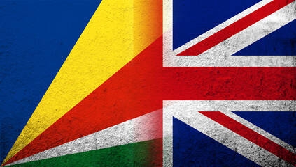 Fototapeta na wymiar National flag of United Kingdom (Great Britain) Union Jack with The Republic of Seychelles National flag. Grunge background