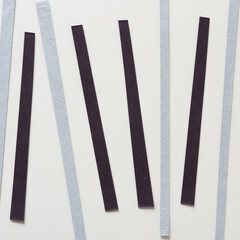 thin pieces of paper on blank paper