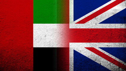 National flag of United Kingdom (Great Britain) Union Jack with National flag of United Arab Emirates. Grunge background