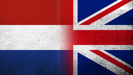 National flag of United Kingdom (Great Britain) Union Jack with The Kingdom of the Netherlands National flag. Grunge background