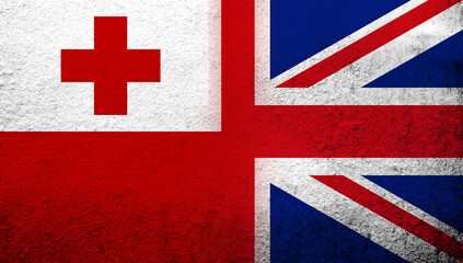 National flag of United Kingdom (Great Britain) Union Jack with The Kingdom of Tonga National flag. Grunge background