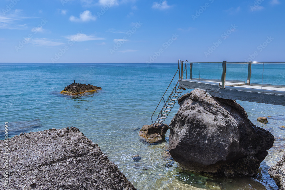 Sticker Ionian Sea seen from shore in Agios Gordios village, Corfu Island, Greece