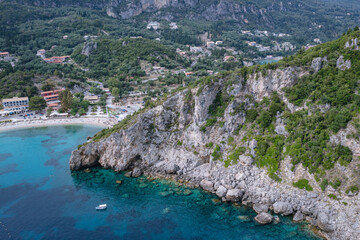 Agios Spyridonas beach an rocky shore in Palaiokastritsa village, Corfu Island, Greece