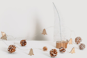 Minimalistic eco friendly scandinavian christmas background in white colors. Place for text