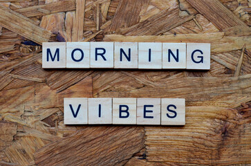 morning vibes text on wooden square, inspiration quotes