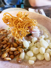 Variety of corn and onions on a plate at a restaurant