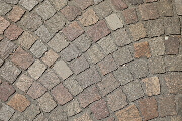 Old pavement from bricks, stone texture footpath