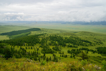 Fototapeta na wymiar Beautiful mongolian landscape under cloudy rainy sky.