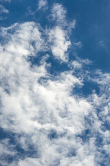 Obraz premium White clouds in a blue sky. Blue sky with clouds, can be used as a background. The vast blue sky and the sky of clouds