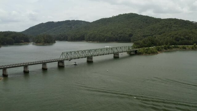 4K aerial view of Lake Allatoona in Georgia with view of Red top mountains and historical Bethany bridge over the lake.