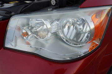 Headlights on red 2013 van.