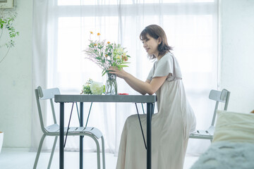 Obraz premium 女性 ライフスタイル フラワー