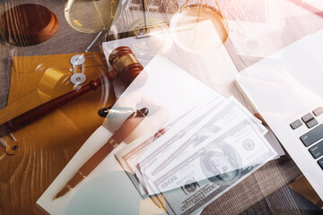 Male lawyer working with contract papers and wooden gavel on tabel in courtroom. justice and law ,attorney, court judge, concept.