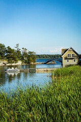 Fototapeta na wymiar Beautiful scenery of Thousand Islands National Park, house on the river, Ontario, Canada