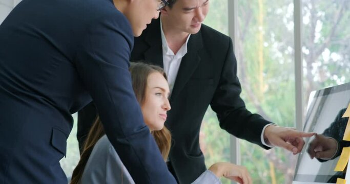 Busines man and woman callcenter team office working with laptop and earphone telesale and call center helpline concept