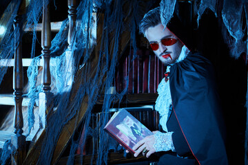 vampire reads a book