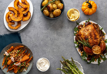 Traditional festive dishes for celebration Thanksgiving Day. Baked chicken, potatoes and sides. Top...