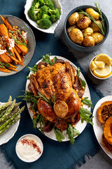 Traditional festive dishes for celebration Thanksgiving Day. Baked chicken, potatoes and sides. Top view, Flat-lay