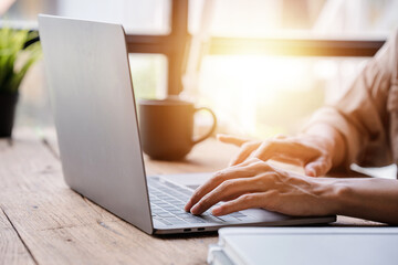 Typing on a tablet computer in a modern office. Make an account analysis report. real estate investment information financial and tax system concepts