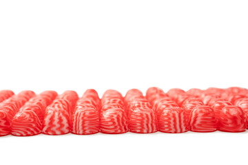 Red round tasty gummy candies islolated on a white background.