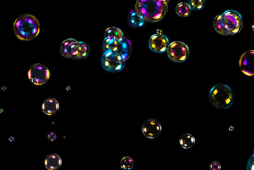 Soap bubbles isolated on a black background