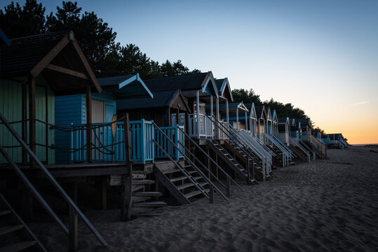 Beach huts at sunset