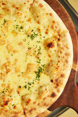 pizza on a wooden board