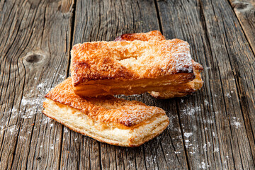 Freshly baked sweet buns on wood table