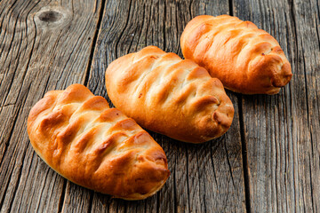 Russian Patties Pasties, Hot Cakes, Pirozhki. Traditional homemade fried pies