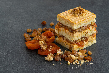 Christmas fruit cake on a gray background