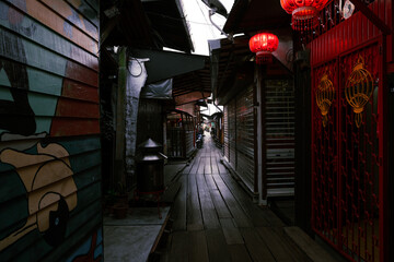 Wooden houses on the sea called Clan Jetty. It is a UNESCO heritage site at Georgetown, Penang, Malaysia. Photo taken at Chew Jetty.