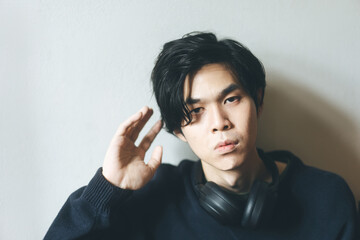 Headshot portrait of young adult asian men in japanese look with black short hair