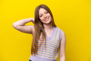 Obraz premium Young caucasian woman isolated on yellow background laughing