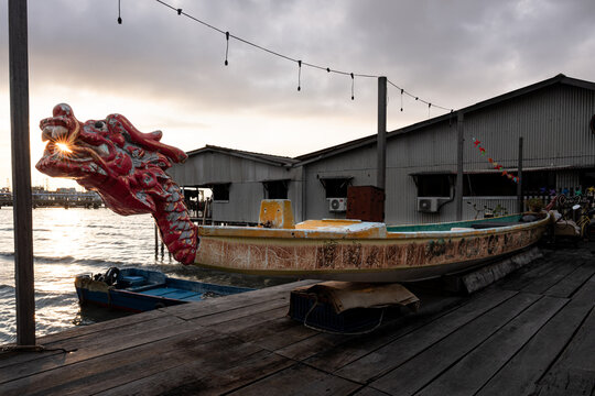 Wooden dragon boat at Clan Jetty. It is a UNESCO heritage site at Georgetown, Penang, Malaysia. Photo taken at Chew Jetty.