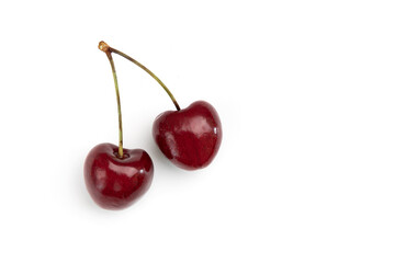 two cherries isolated on white background, top view