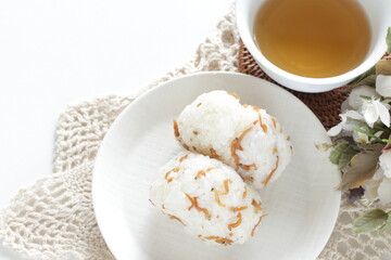 Japanese, pepper and small sardine fishes on white dish