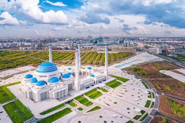 Nur-Sultan, Kazakhstan - August 8, 2022: largest mosque in Central Asia, Astana Aerial drone view