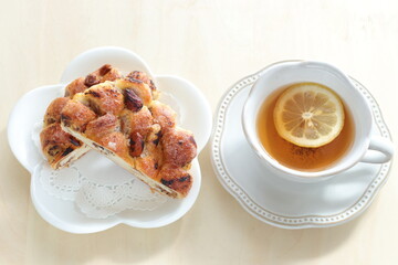 Chestnut in bread and lemon tea for breakfast 