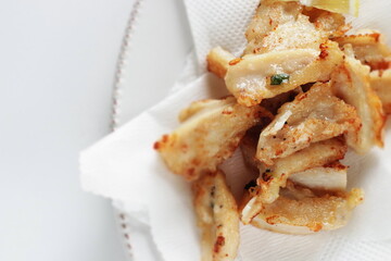 Chinese food, deep fried chicken soft bone served with Lemon