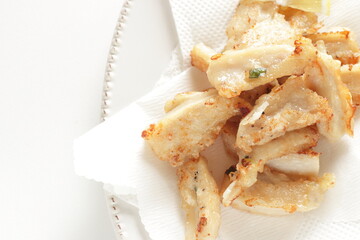 Chinese food, deep fried chicken soft bone served with Lemon