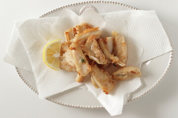 Chinese food, deep fried chicken soft bone served with Lemon