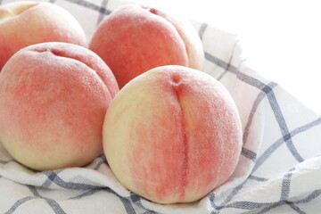 Freshness Japanese peach on linen for Summer fruit image