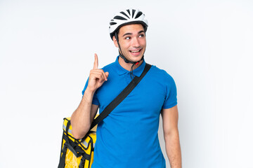 Young caucasian man with thermal backpack isolated on white background intending to realizes the solution while lifting a finger up