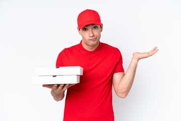 Pizza delivery caucasian man with work uniform picking up pizza boxes isolated on white background...