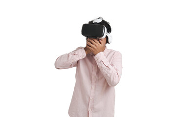 Young peruvian man amazed wearing virtual reality headset. Isolated over white background.