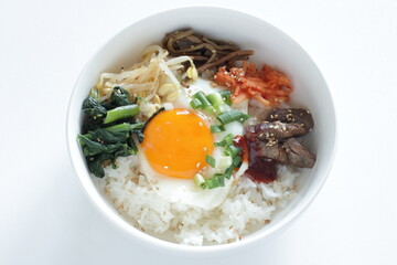 Korean food, namul assorted seasoning vegetable with sunny side up fried egg and gochujang