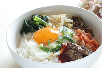 Korean food, namul assorted seasoning vegetable with sunny side up fried egg and gochujang