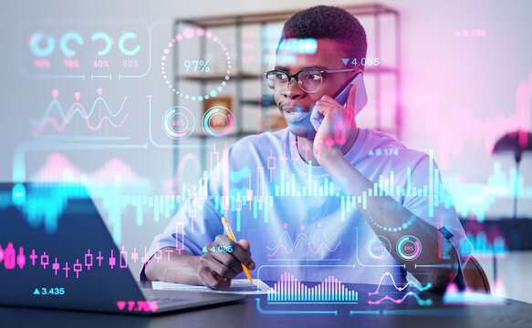 African businessman calling on the phone, forex diagrams with analysis