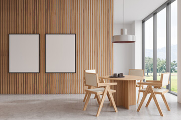 Light meeting room interior with seats and eating table, mockup frames